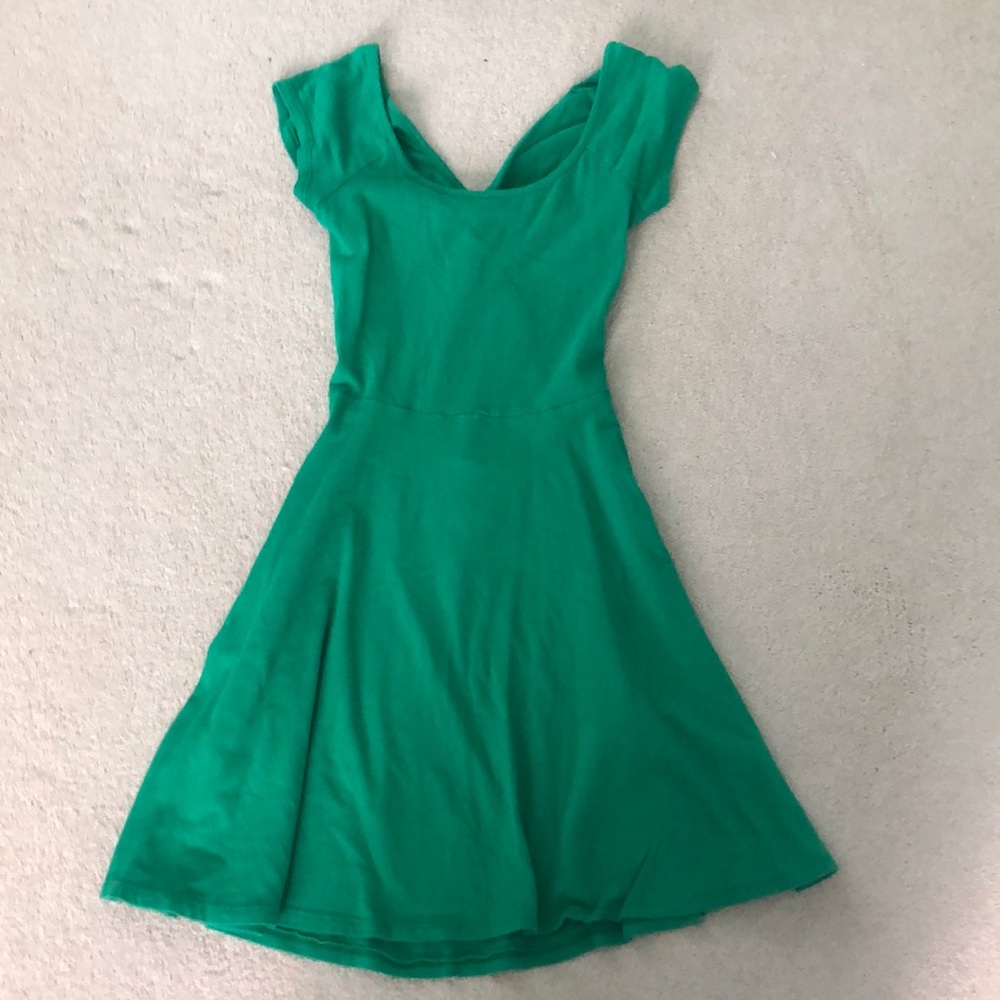 Green open back dress